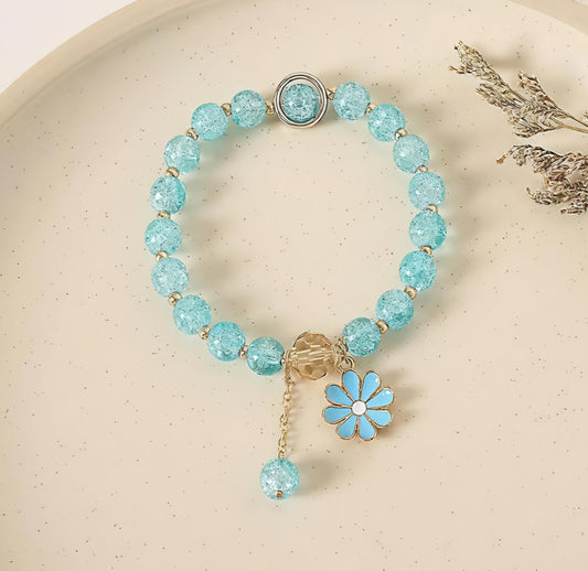 "Elegant Blue Crystal Bead Bracelet with Floral Charm"